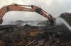 Свалка отходов лесопиления горит больше недели в Магистральном Иркутской области